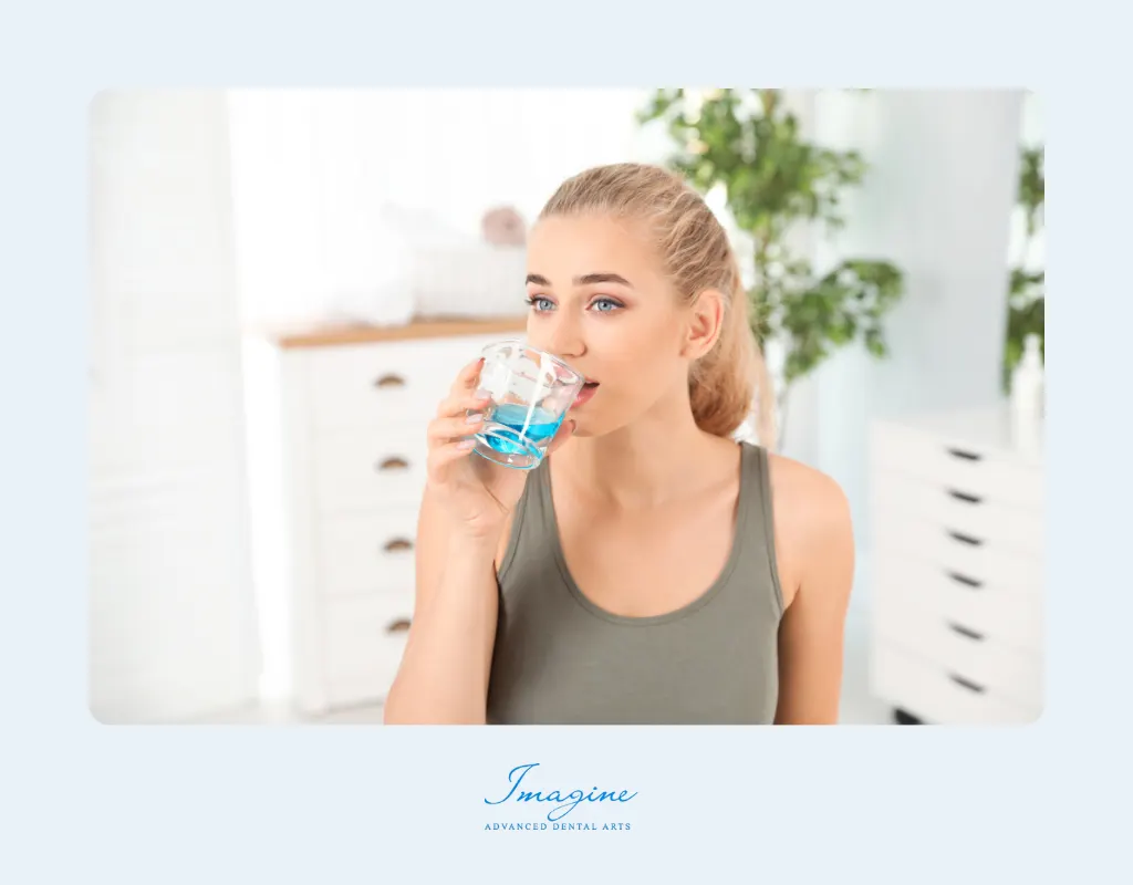 Person rinsing with mouthwash